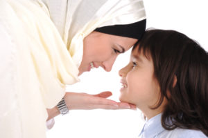 Muslim mother and son loving each other